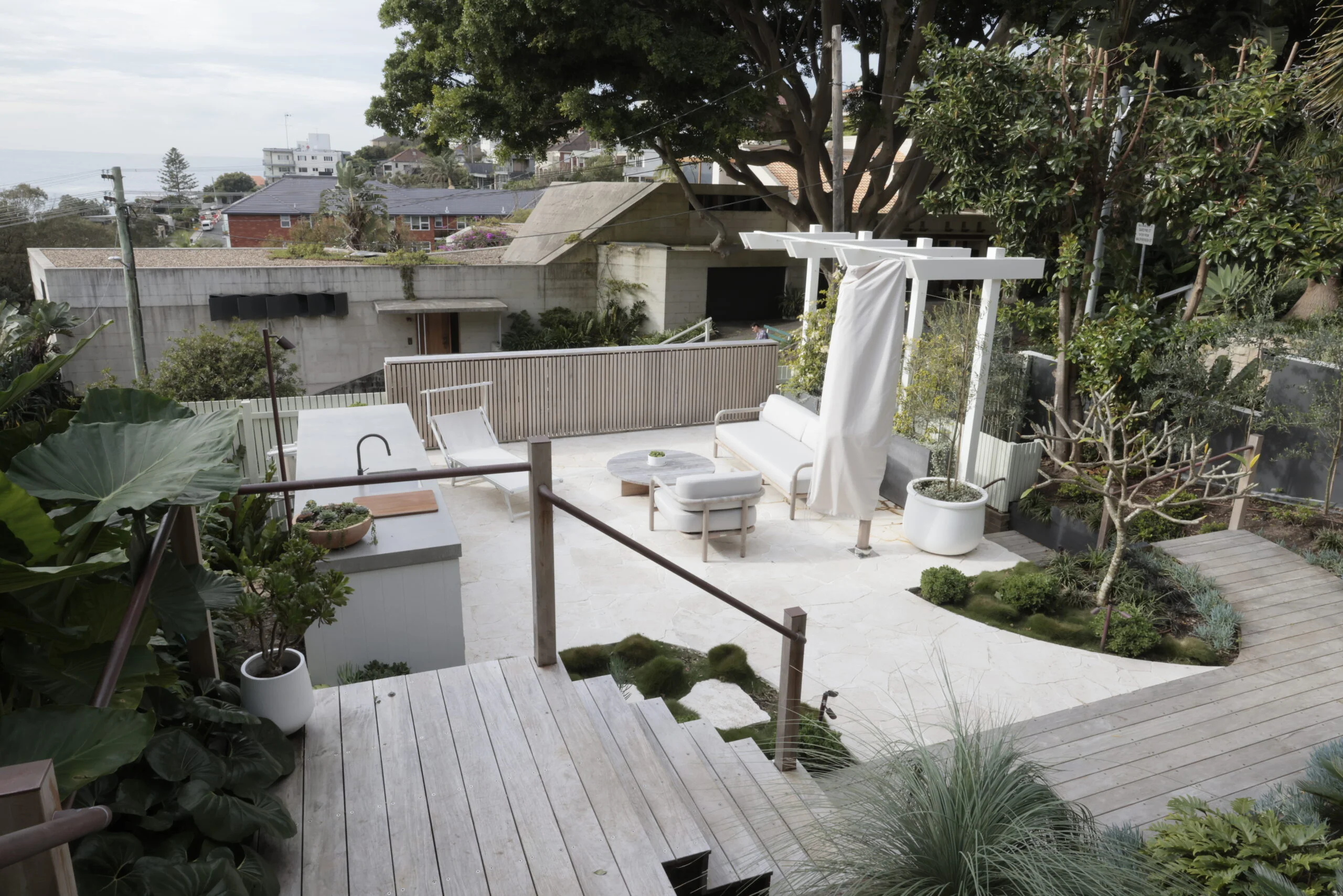 White timber open pergola over a patio