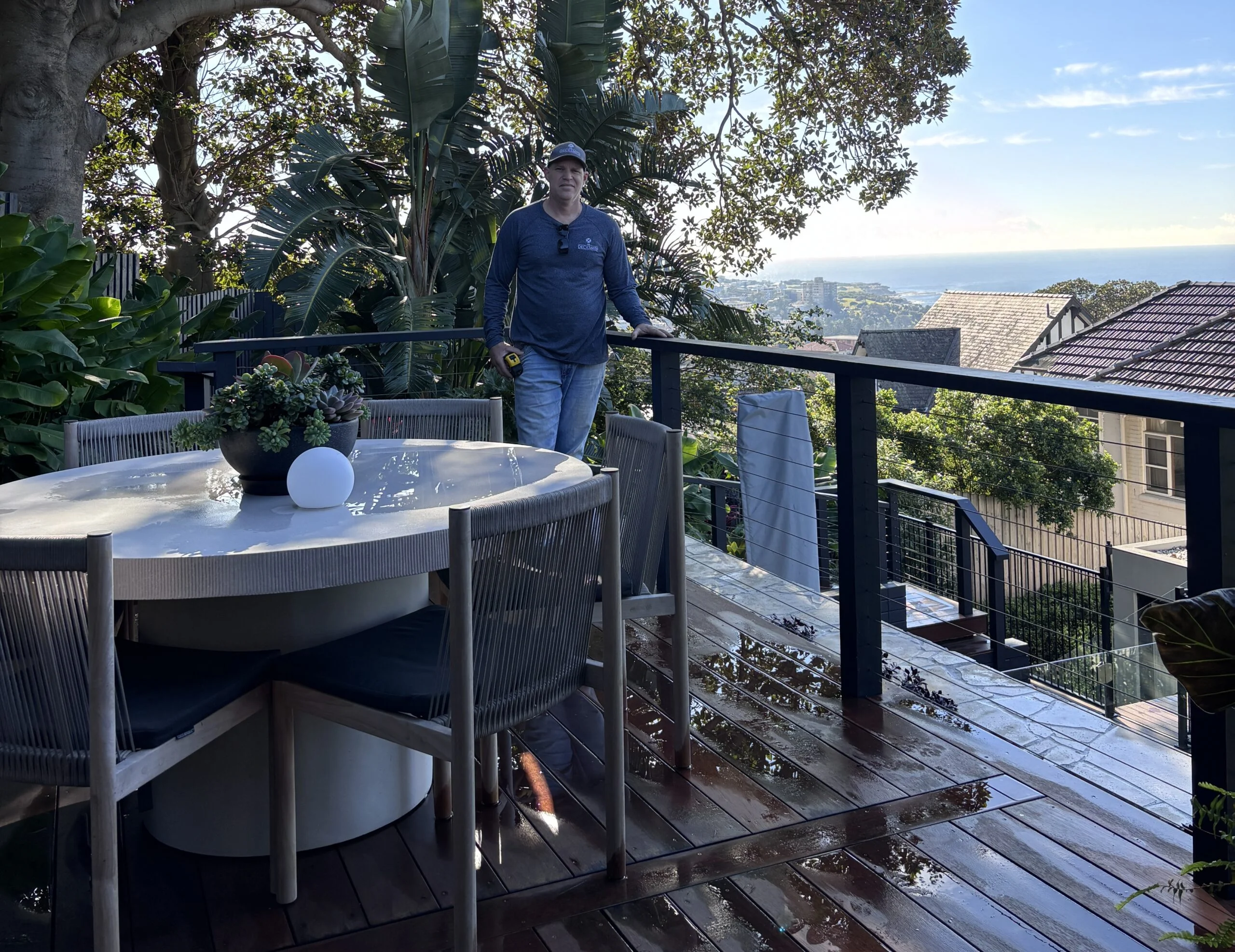 Sydney deck builder Greg discussing specs with a client on site