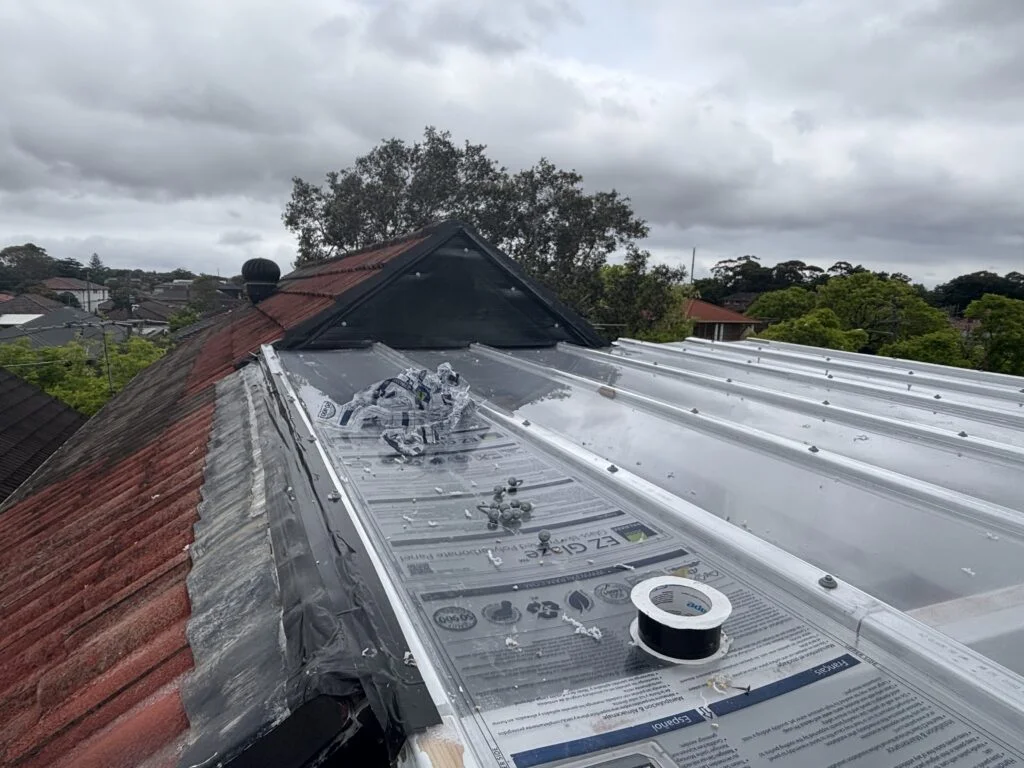 EzGlaze sheets going on, Mascot rooftop