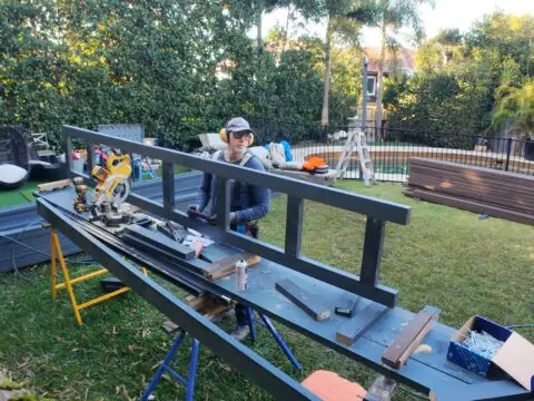 Greg cutting and fitting balustrade timber on site, Vaucluse