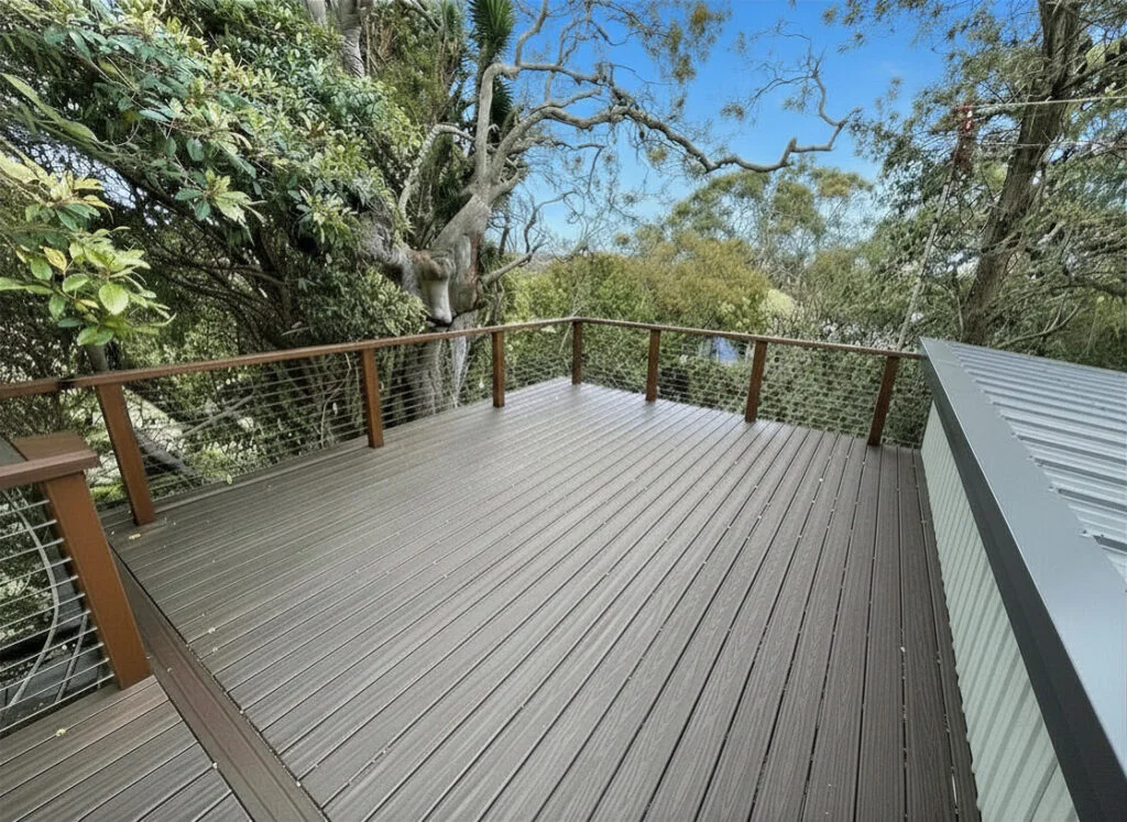 Finished Trex Transcend composite deck at Bundeena with stainless cable balustrade overlooking bushland