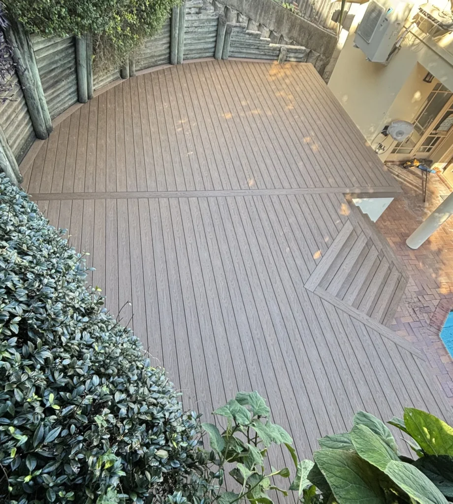 Completed Double Bay composite deck showing the curved edge and herringbone steps