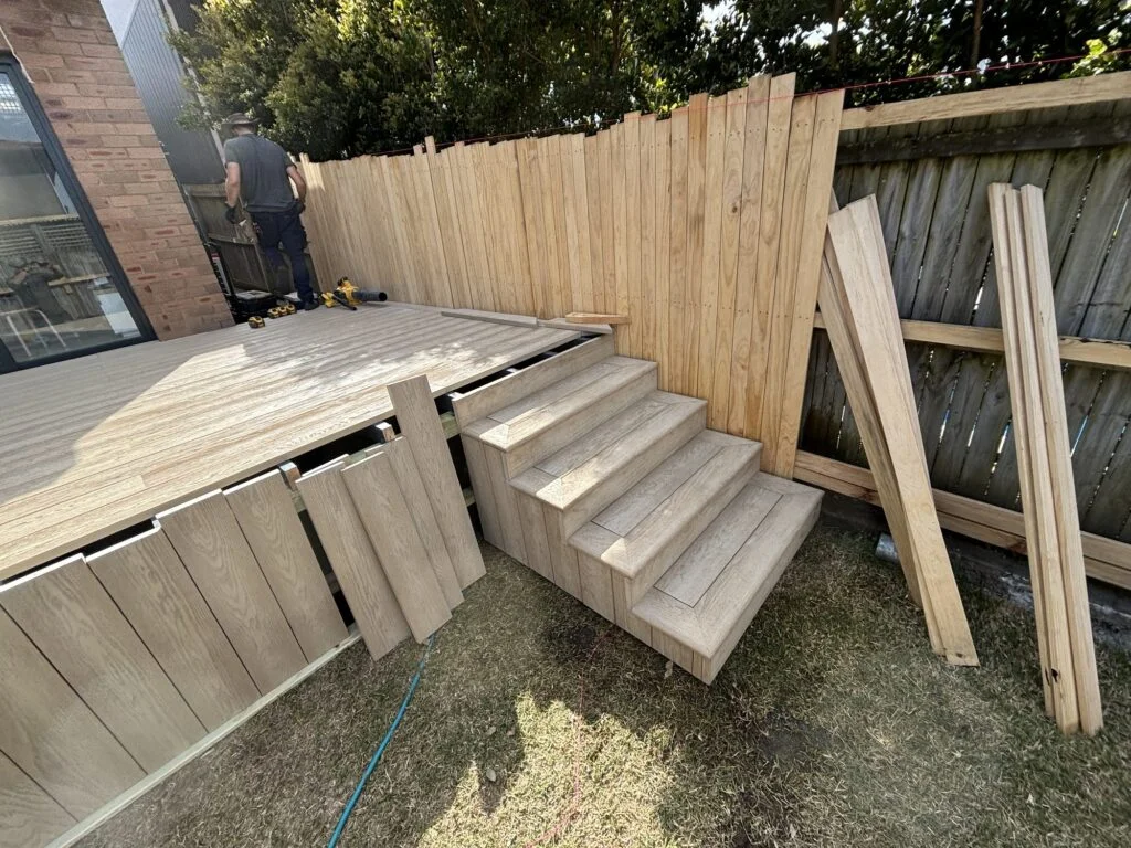Fascia clad in matching decking beside the inset corner stairs, Dover Heights