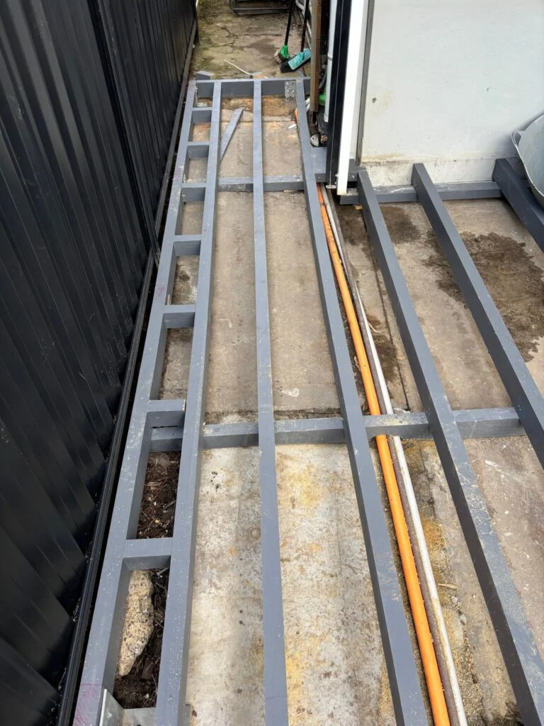 Picture frame decking and pipe clearance in Kingsford