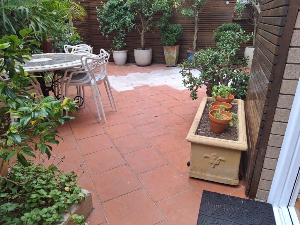 Terracotta tiled courtyard in Neutral Bay before decking