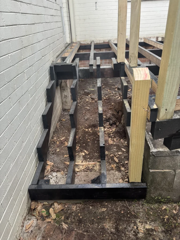 Stair stringers fully coated in bitumen waterproofing, Neutral Bay