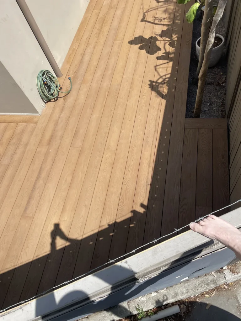 Finished Millboard deck seen from over the boundary fence, Rose Bay