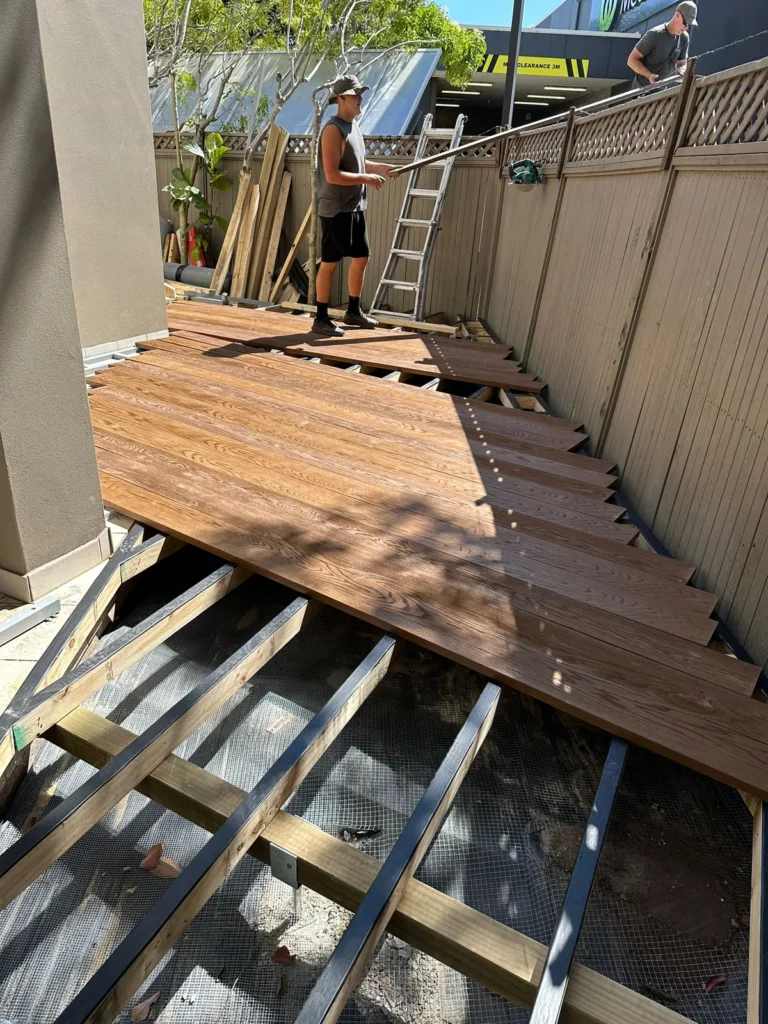 Millboard going down, access over the fence, Rose Bay