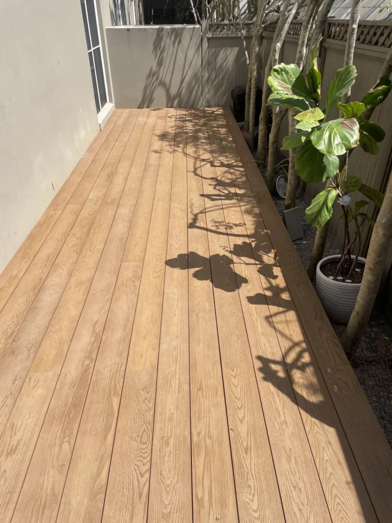 Finished Millboard deck with trees and planters, Rose Bay
