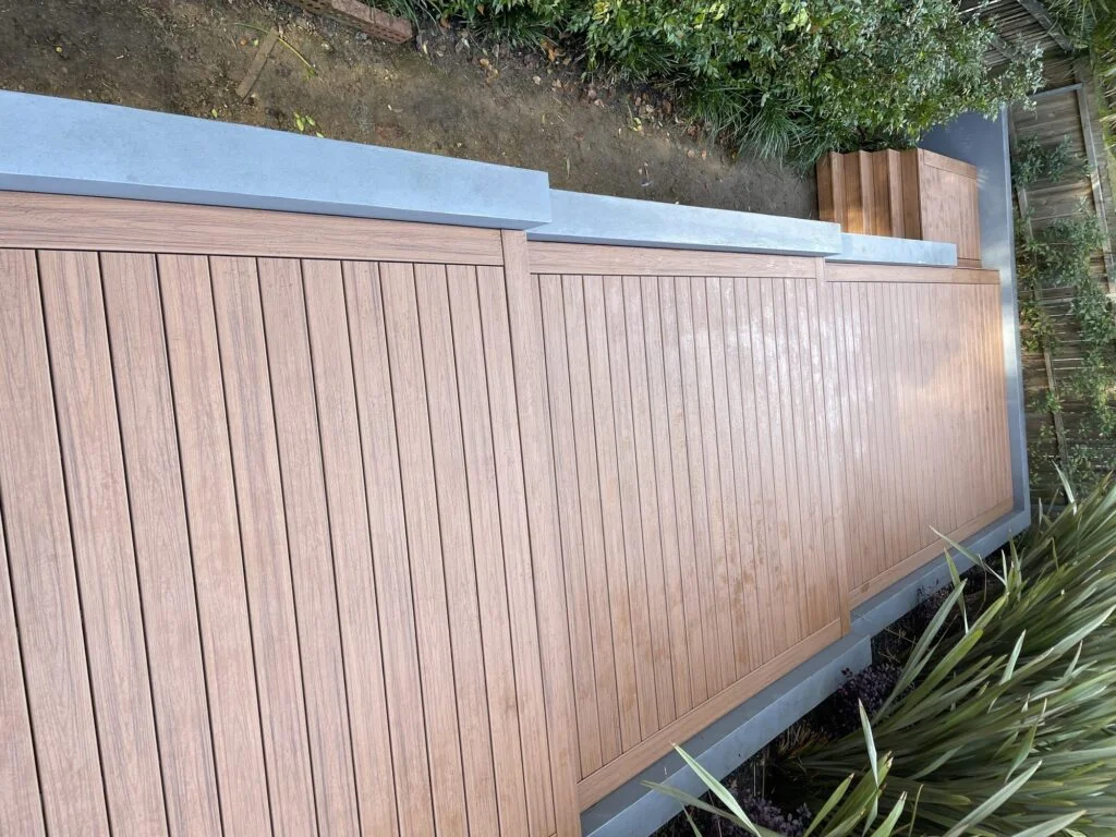 Finished stepped Trex Transcend Tiki Torch deck with steel-stringer stairs to garden, Pymble