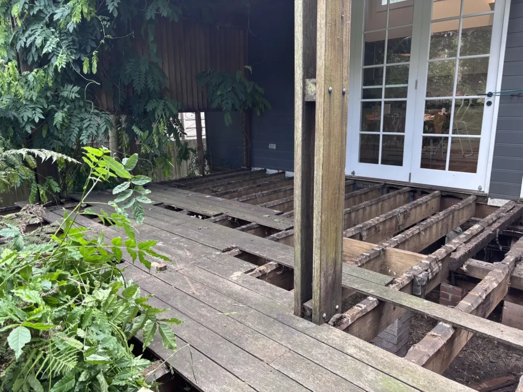 Decking boards lifted during demolition, Waverley deck rebuild